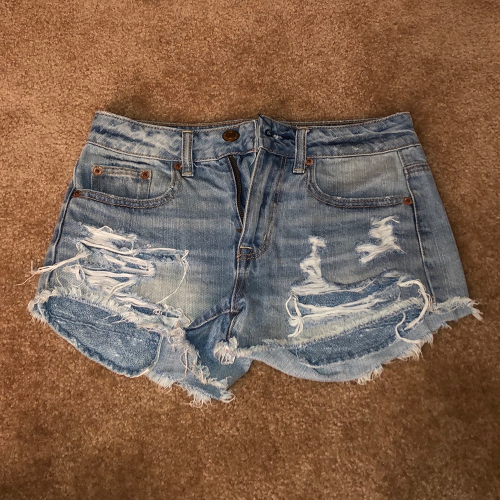 medium wash ripped jean shorts